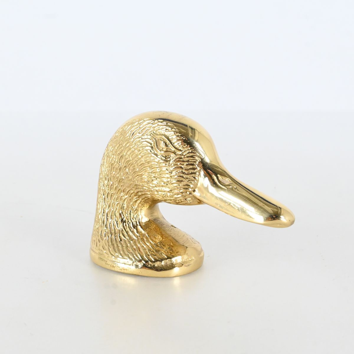 Flasköppnare, mässing, Ducky på auktion i Luleå, Norrbottens län hos Luleå Auktionsverk
